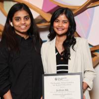 recipient with her award and picture